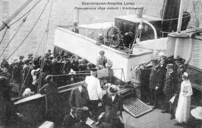 Passengers boarding the steamship from the feeder at Kristiansand, Norway