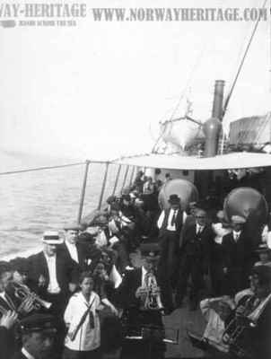 A band is entertaining the passengers on the deck of the S/S United States on a voyage in July 1913