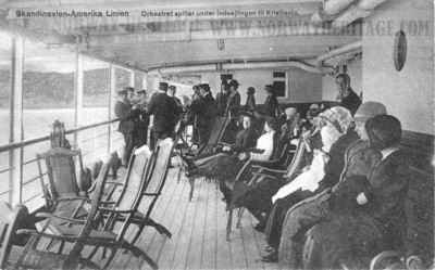 Daily life aboard the Scandinavian America Line steamship Hellig Olav, the band is playing for the passengers on the promenade deck