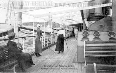 Scandinavian America Line passengers playing a game of Shuffle Board on the promenade deck of the S/S United States