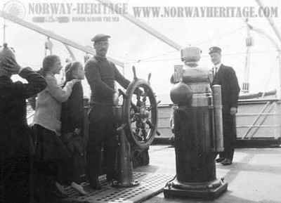 Passengers and crew on the bridge of the S/S United States. Photographed on a voyage in July 1913