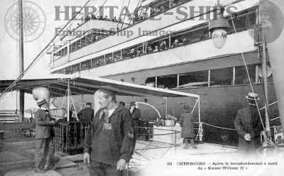 Norddeutscher Lloyd steamship built 1902 at Stettin by AG Vulcan. On this old postcard the ship is seen when calling at Cherbourg, France. The tender Lloyd is alongside to embark and disembark passengers and bagage.